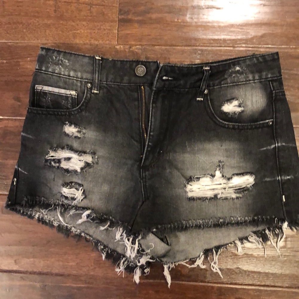 Distressed black shorts